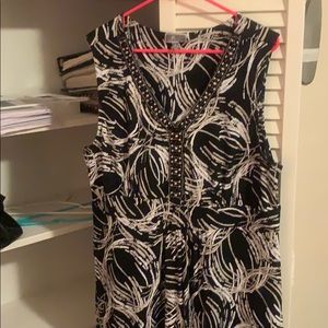 Black sleeveless dress with tan and cream swirls